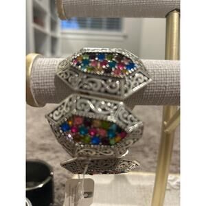 bracelet by the brand cherry. multi color stones